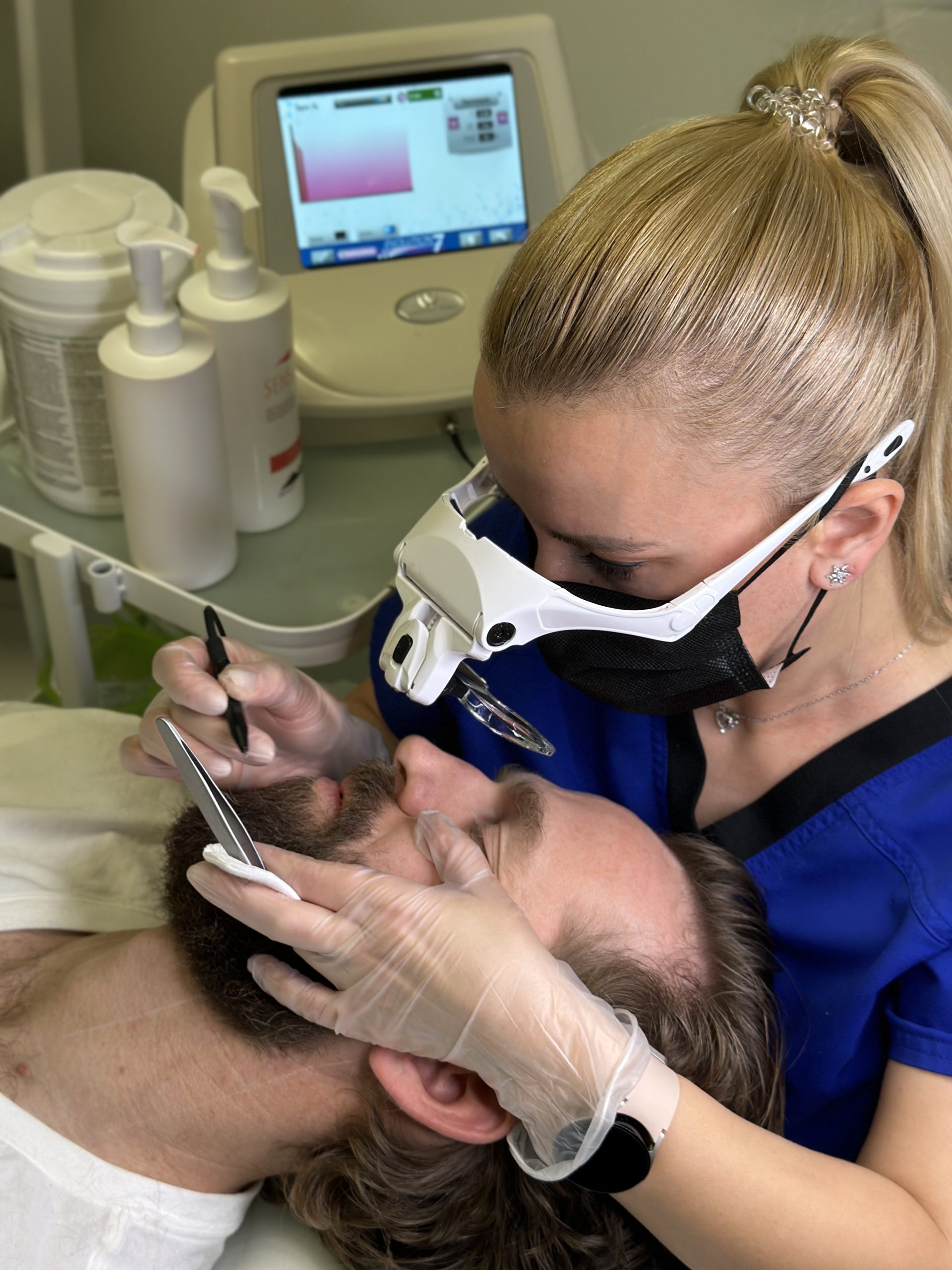 Oliya providing electrolysis procedure